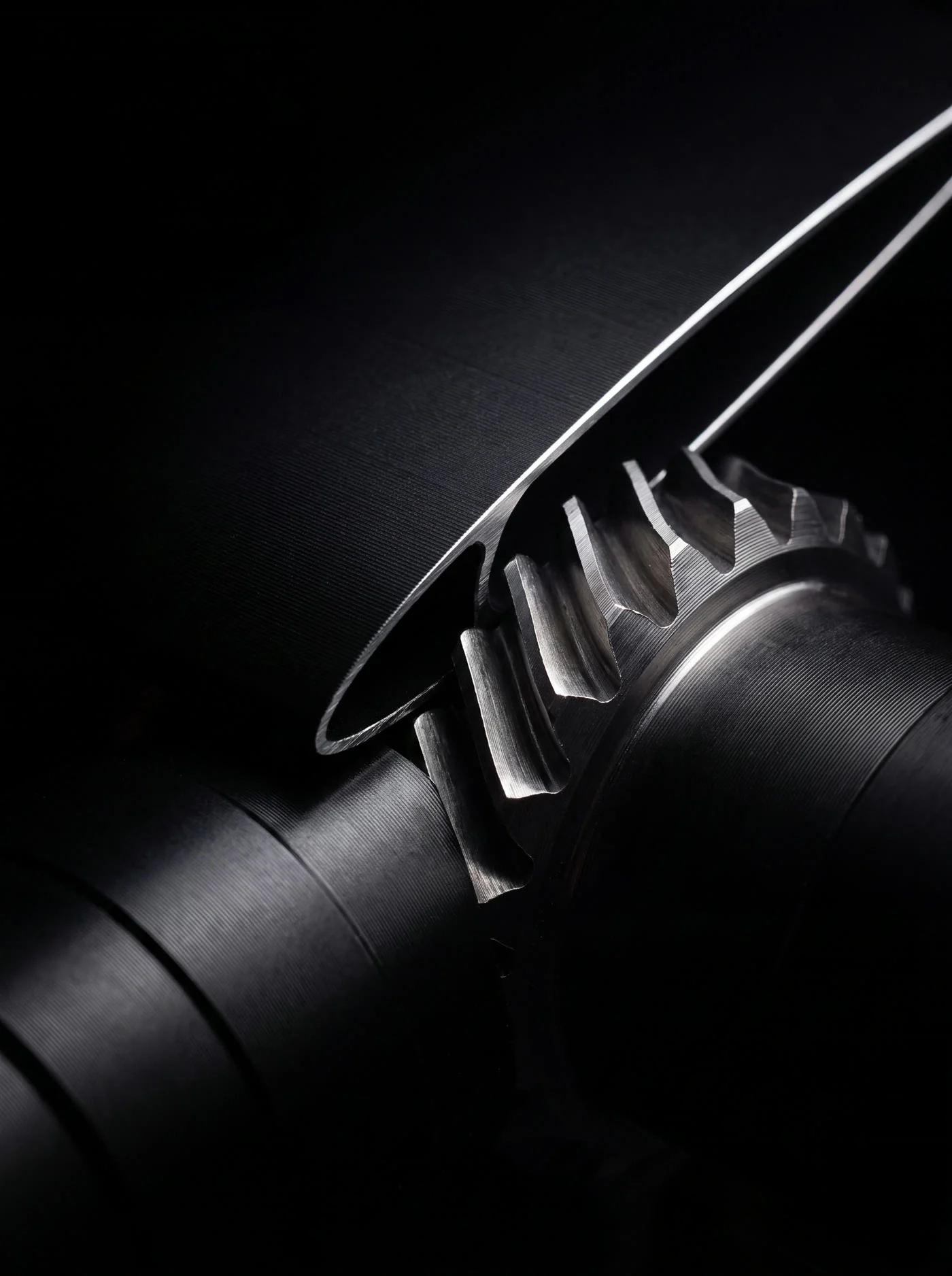 Close view of a louver blade edge meeting its drive.