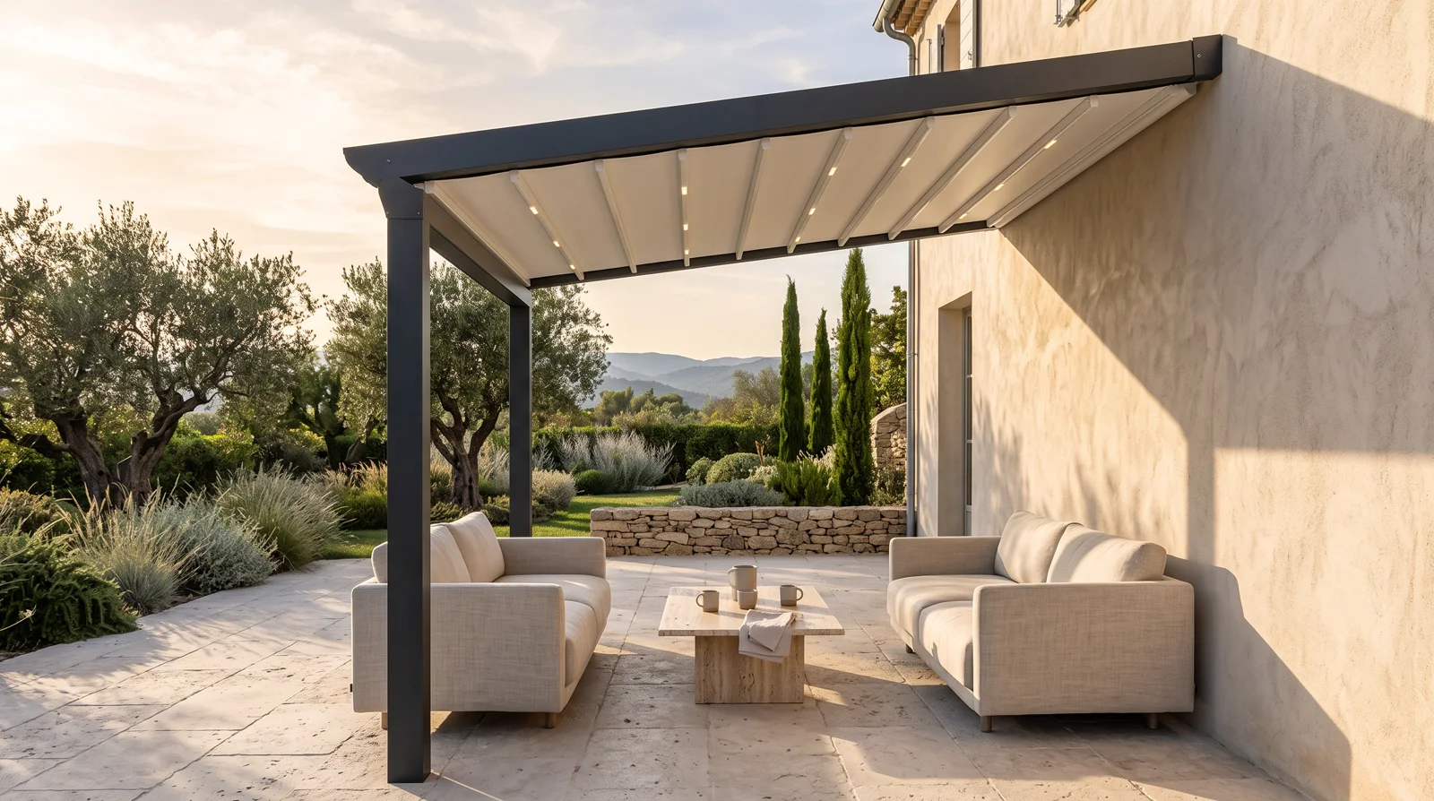 Wall-attached fabric pergola with a flat closed membrane in crisp parallel ribs, carried on posts at the outer edge over a Mediterranean terrace