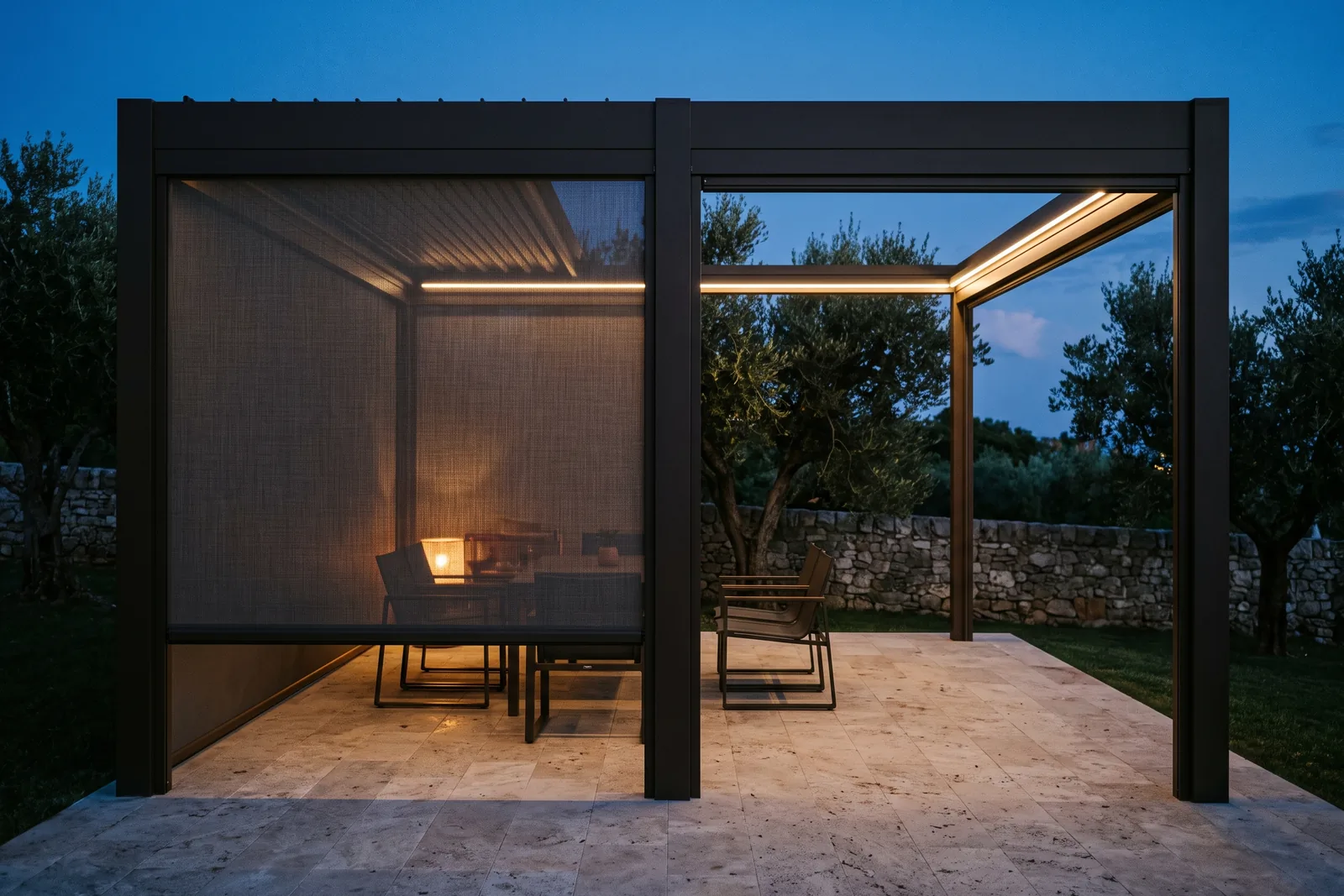 A zip screen lowered in sealed side channels beside an open bay, warm light glowing through the mesh